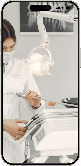 Dental lab technician working with equipment and digital case submission