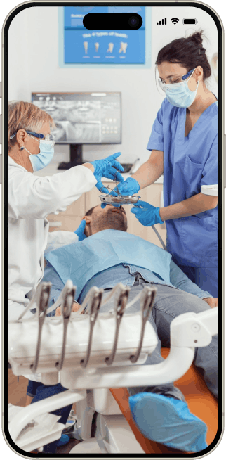 Dental professionals performing a dental scan procedure inside a clinic